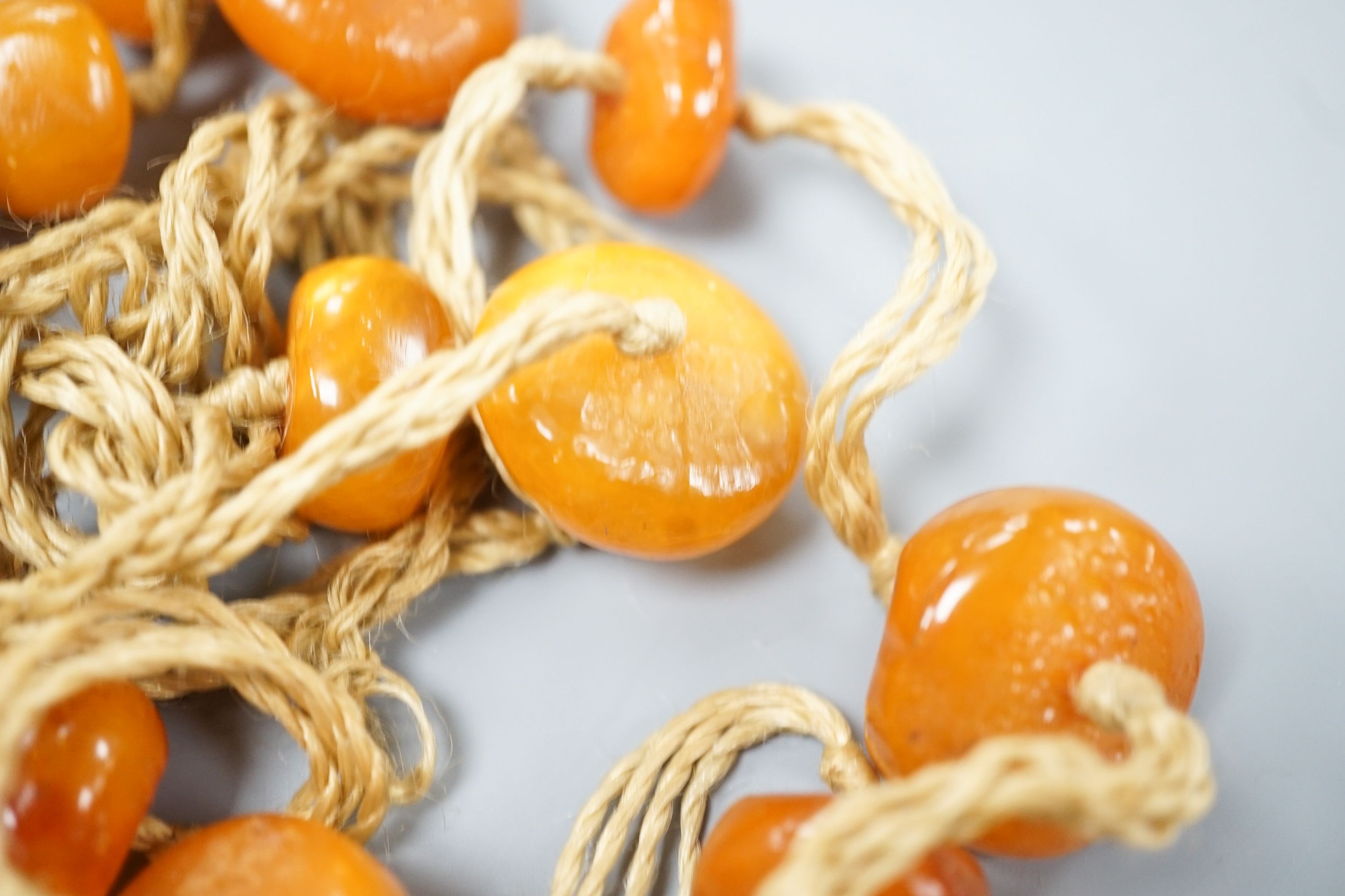 A butterscotch amber bead necklace, gross weight 55 grams.